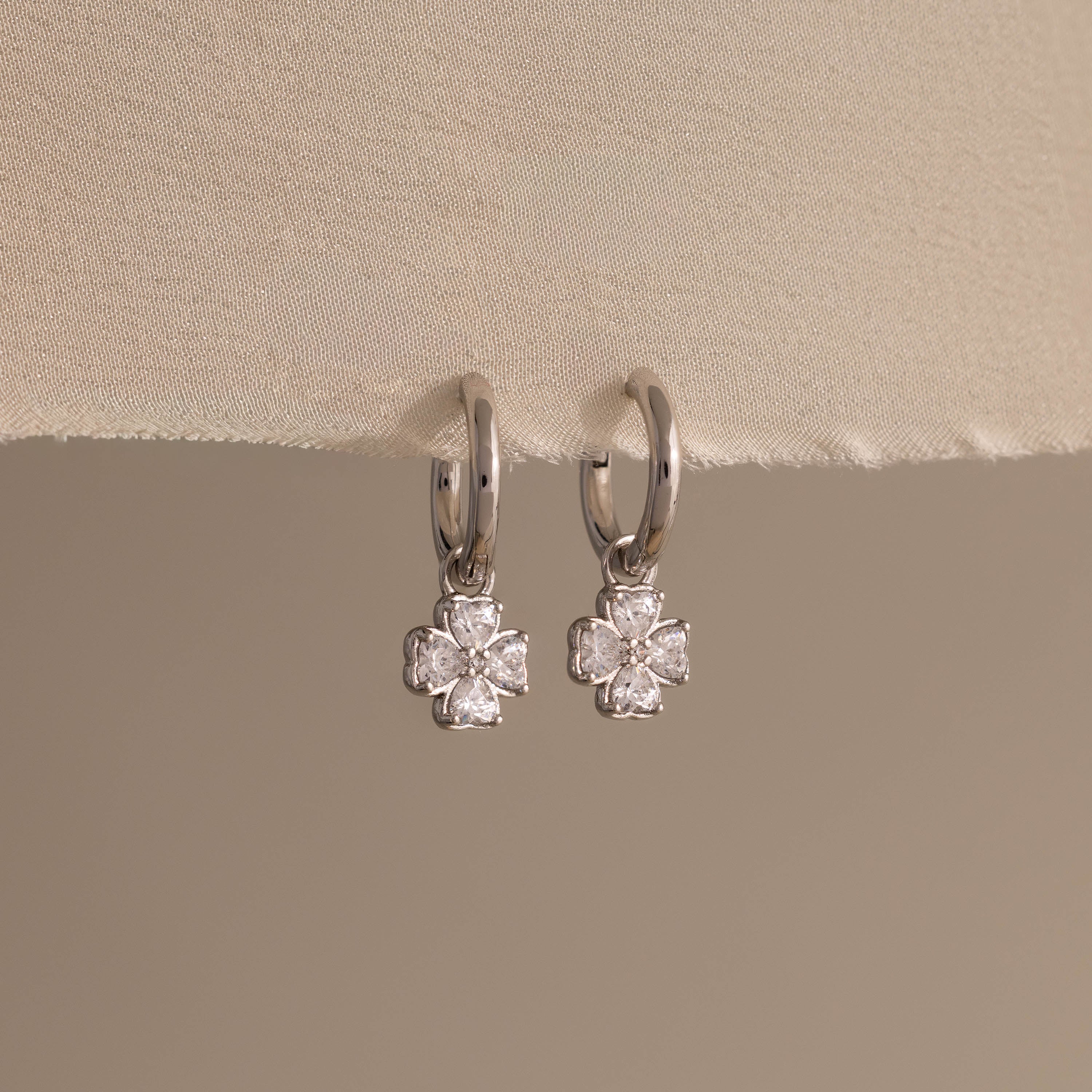 Diamond Clover Huggies in Silver