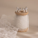 Pearl Diamond Bow Studs in Silver