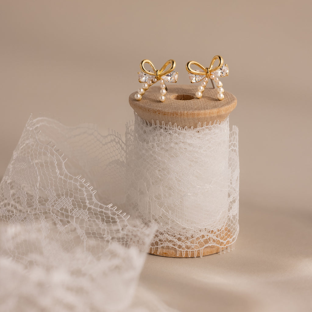 Pearl Diamond Bow Studs in 18K Gold