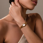 Montre ovale fine en or 18 carats