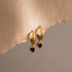Dangling Garnet Heart Huggies in 18K Gold