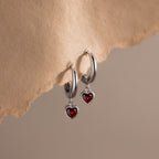 Dangling Garnet Heart Huggies in Silver