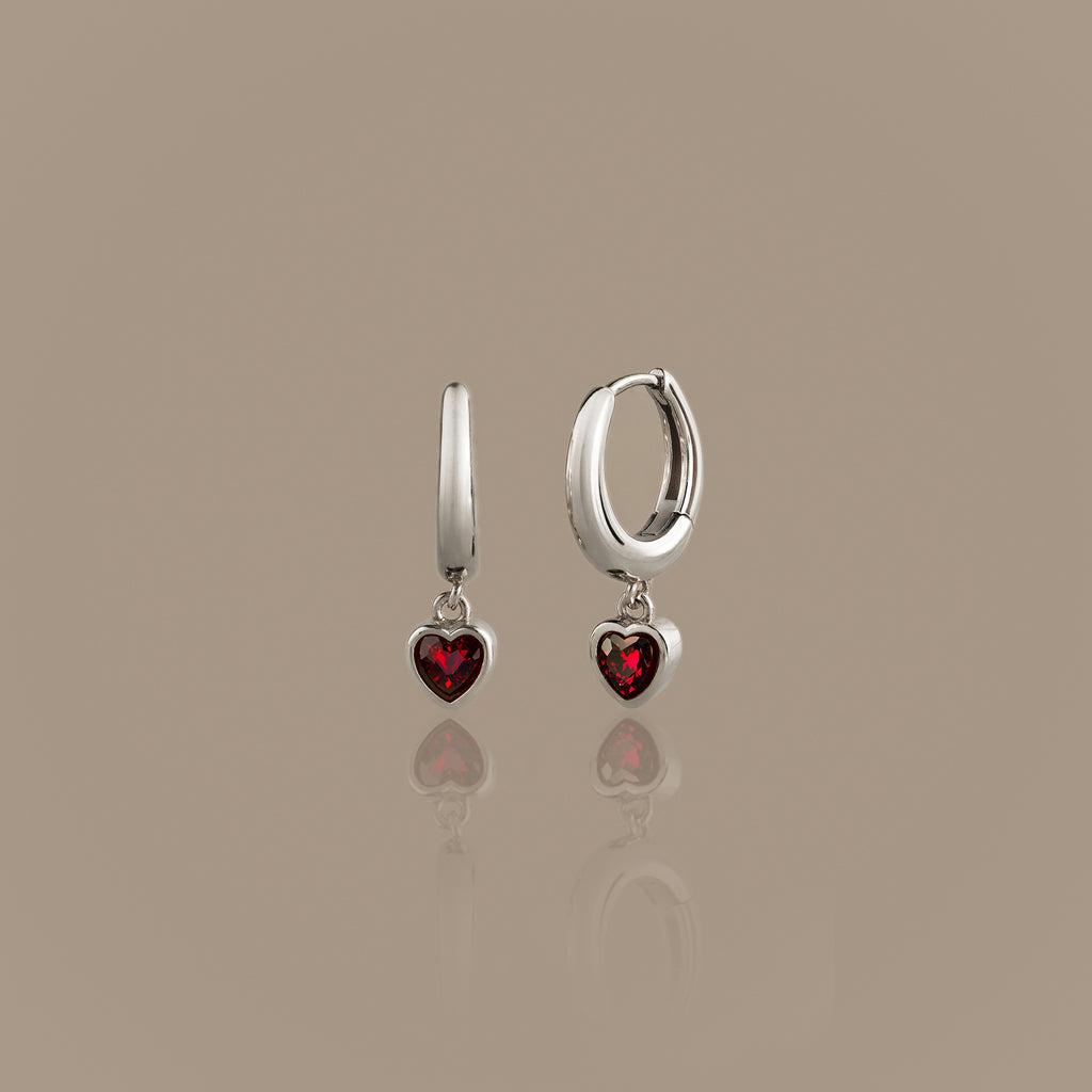 Dangling Garnet Heart Huggies in Silver