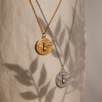 The Bee Coin Necklace in gold and silver features a round bee coin pendant—perfect as a honeybee necklace or for stylish layering.