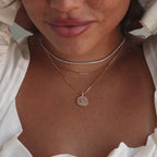 Collier disque initial en perles