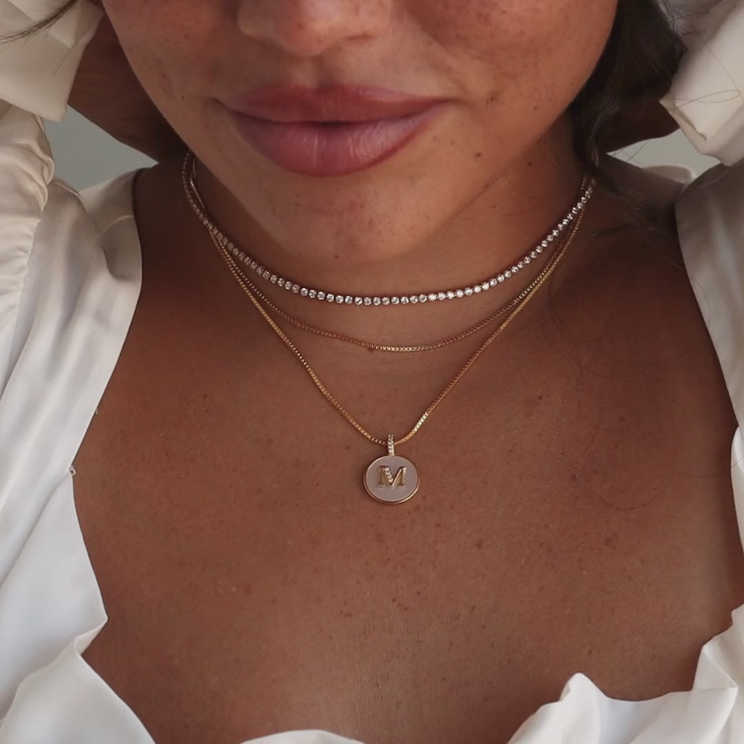 Collier disque initial en perles