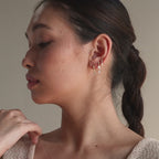 Clous d'oreilles en opale et diamant
