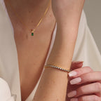 Pulsera de tenis con esmeralda y baguette