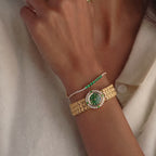 Montre festonnée en émeraude