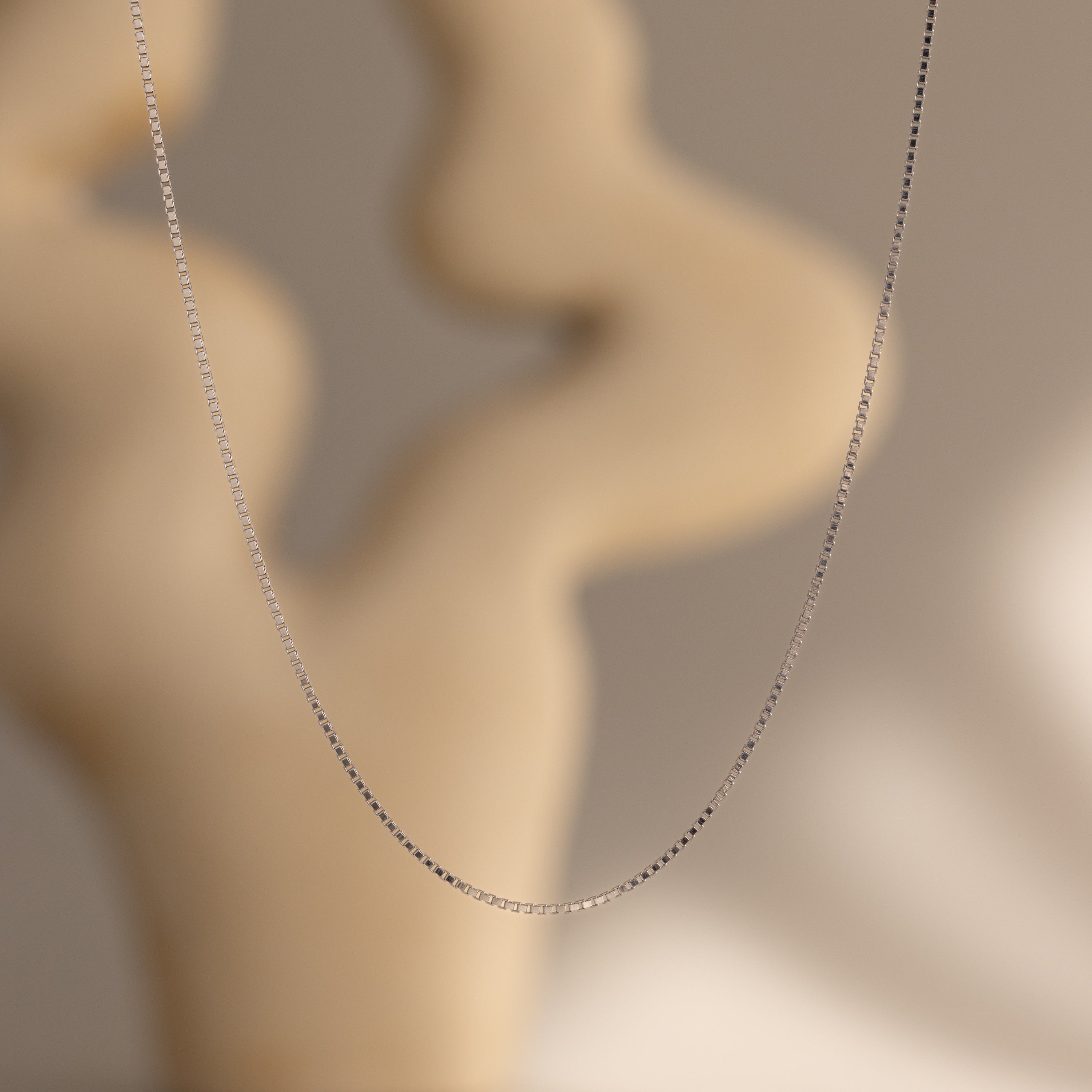 Collar de cadena de caja