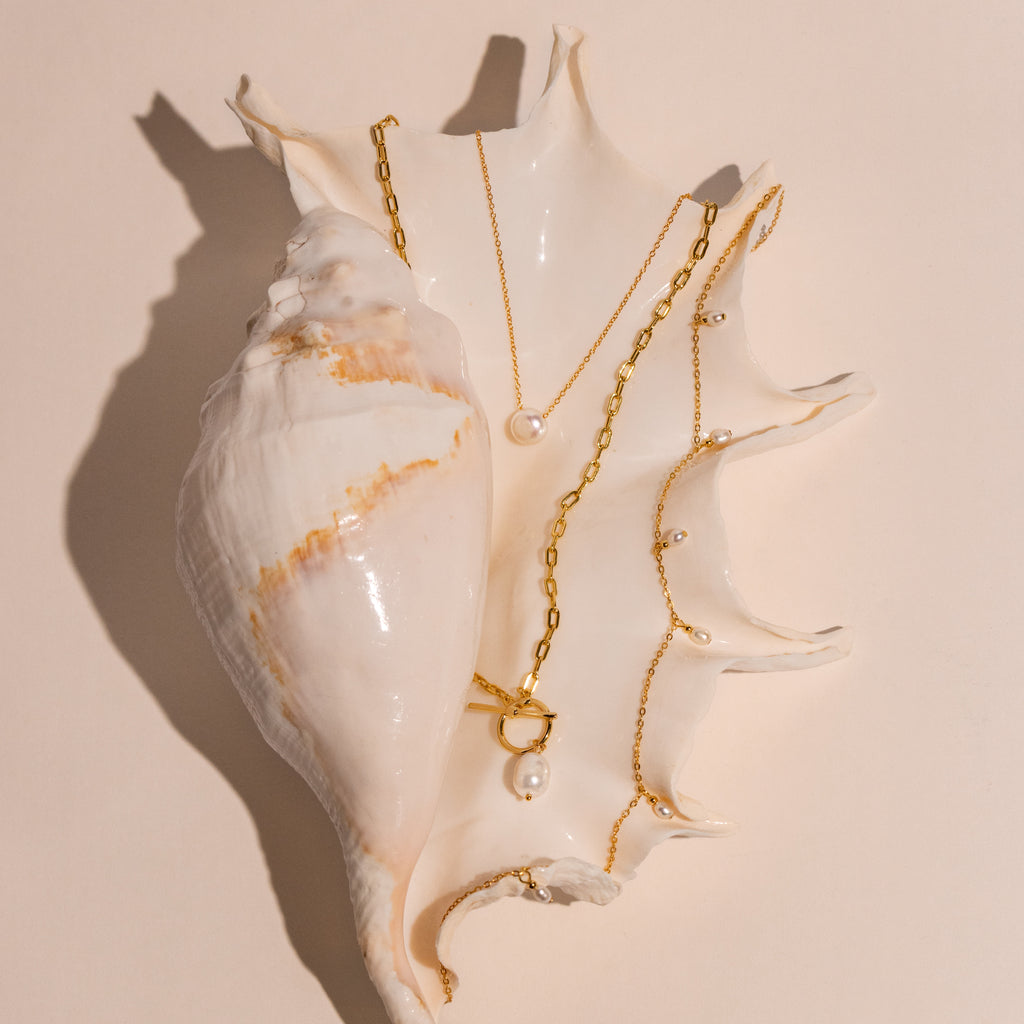 Collier à bascule en perles et trombone