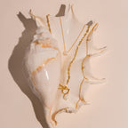 Collier à bascule en perles et trombone