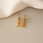 Baguette Topaz Huggies