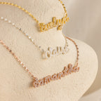 Three Pave Dream Script Name Necklaces personalized with "Evelyn" in gold, "Claire" in silver, and "Samantha" in rose gold—each custom piece adds a unique touch to your style.