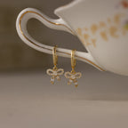 Pave Bow Charm Hoops in 18K Gold