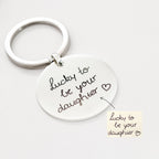 The Handwriting Circle Keychain, engraved with your handwritten message "Lucky to be your daughter" and a heart, makes a thoughtful personalized gift she’ll cherish.