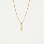 The Dainty Tag Name Necklace in Rose Gold features a rectangular pendant engraved with "love," showcased on a plain white background. This elegant and timeless piece is perfect for everyday wear.