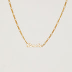 The Mellow Name Necklace in Figaro Chain features "Brooke" in elegant cursive, shown on a classic chain against a plain white background.