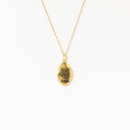 Oval Pet Necklace with an engraved cat face and the name Bella—ideal personalized pet jewelry or a unique pet portrait accessory for animal lovers.