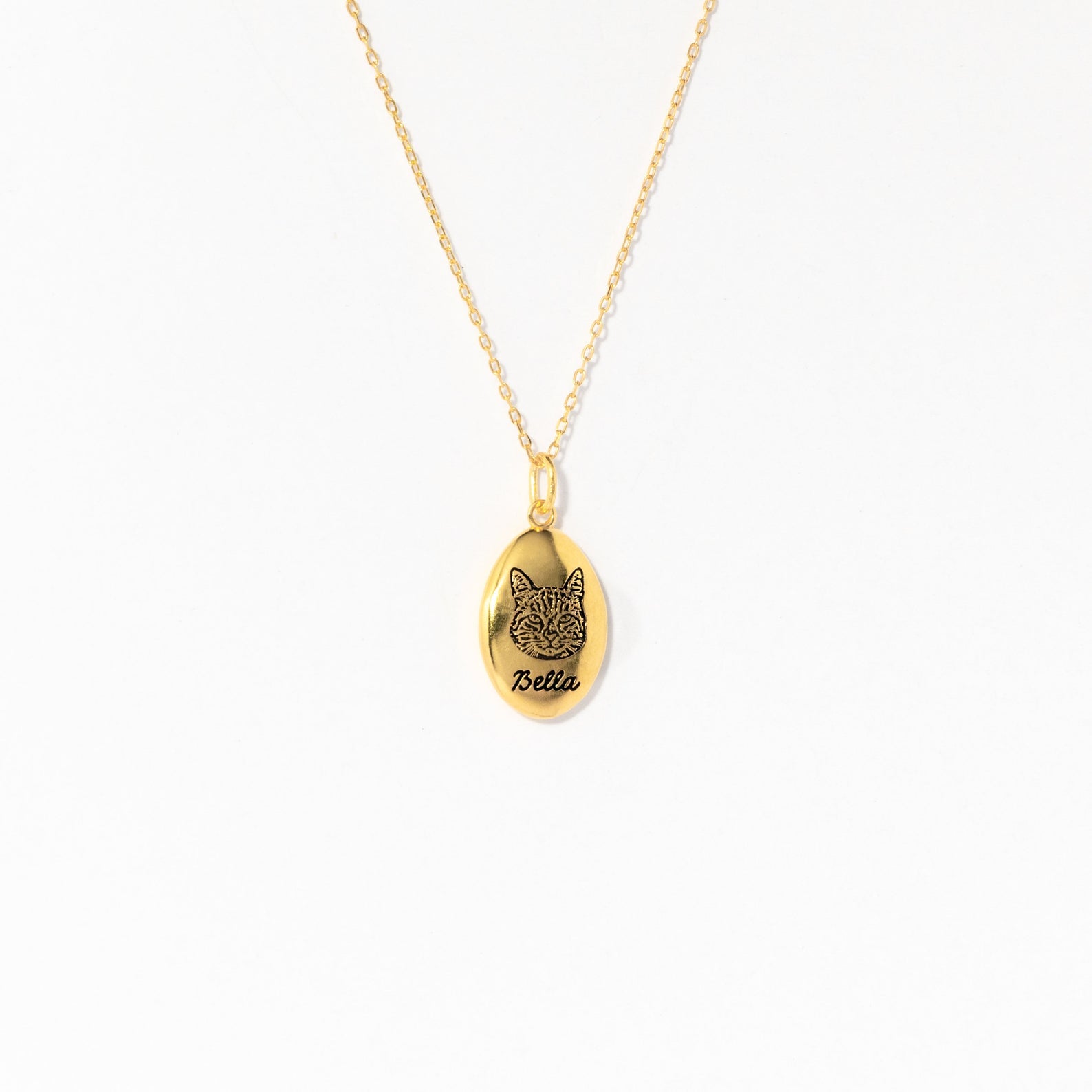 Oval Pet Necklace with an engraved cat face and the name Bella—ideal personalized pet jewelry or a unique pet portrait accessory for animal lovers.
