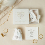 The Dainty Bar Studs come in a minimalist jewelry box with gold rings, a necklace, small pouches, and a “just for you! Enjoy!” card—perfect for displaying or building your minimalist earring stack.