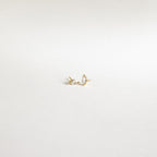 The Classic Marquise Diamond Studs feature two gold earrings with marquise-cut diamonds, adding subtle elegance to any look.