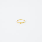 The Nala Tiny Heart Ring in gold is a delicate and dainty piece, ideal as a promise ring or for stacking with your favorite rings.