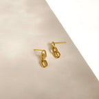 Add a touch of elegance with the Amia Pave Link Earrings, featuring a classic gold finish and sparkling pavé accents in a stylish paperclip link chain design.