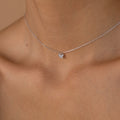 Close-up of the Mandy Pave Butterfly Necklace in silver, featuring a delicate butterfly pendant resting on the neck and collarbone—ideal for lovers of elegant gold or silver jewelry.