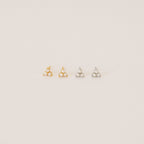 The Maud Pearl Studs feature elegant pearls and small stones, making them a timeless gift and a luxurious jewelry accent for any occasion.