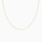 Isolated product shot of the Figaro chain necklace on a white background, showcasing its symmetrical link design.