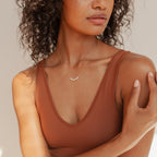Model is wearing Gold Pearl Bead Necklace