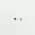 Malachite Studs: gold stud earrings with small green square gemstones in a geometric box shape, shown on a plain white background.